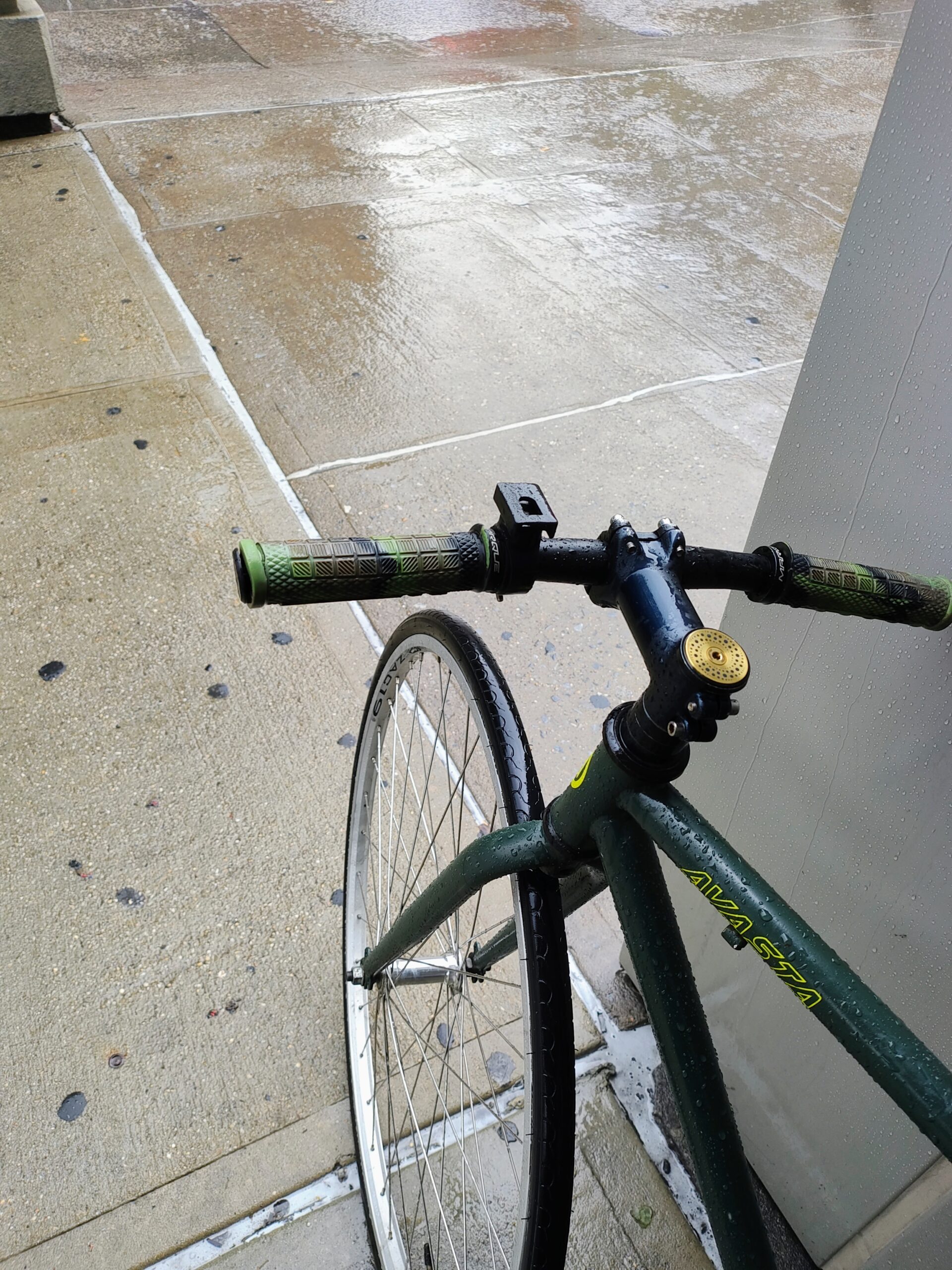 Cycling in the rain waiting for my next delivery order.